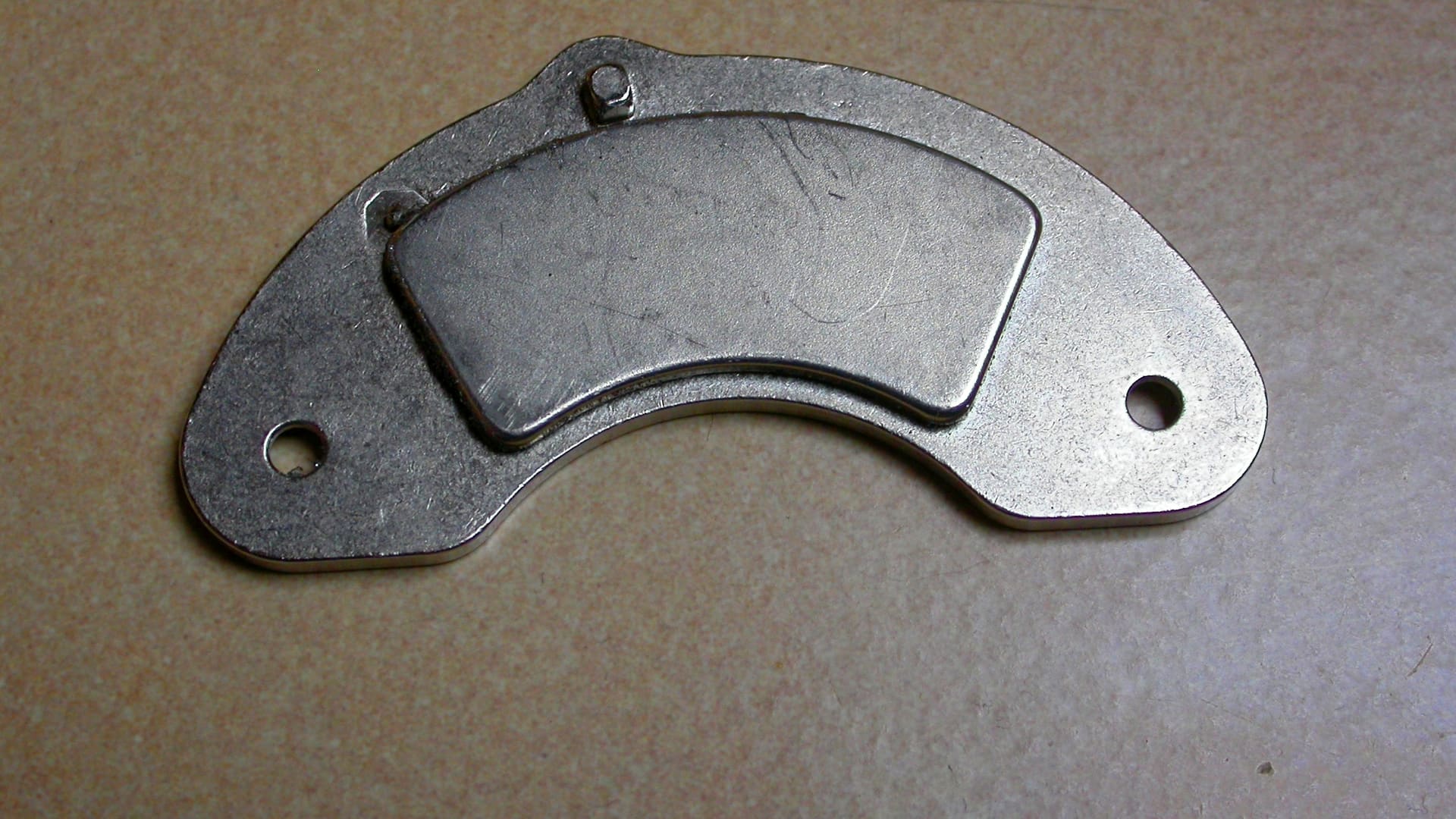 Close-up of a magnet salvaged from an old computer hard disk drive