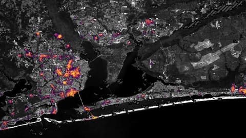 Before and after NASA satellite imagery showing Hurricane Isaias dimming coastal lights