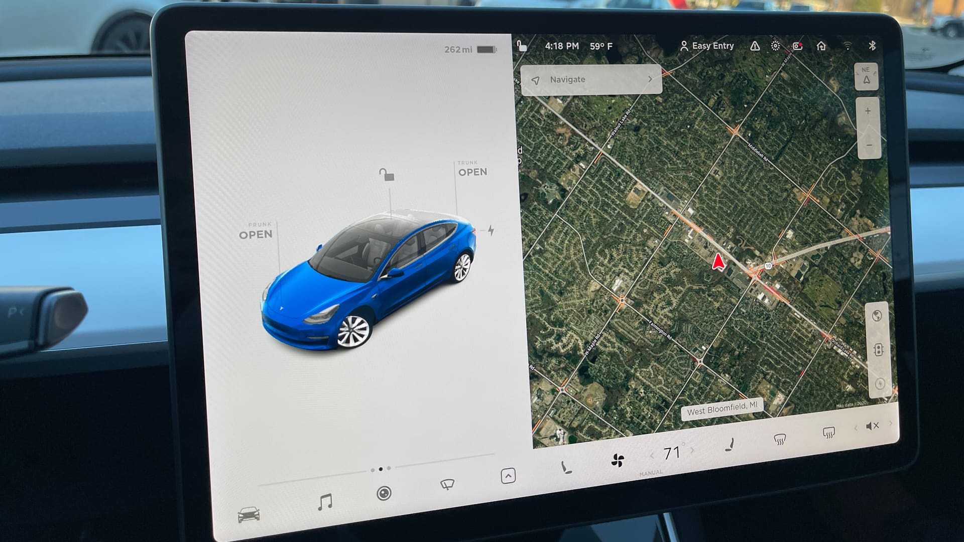 Tesla Model 3 central 15.4-inch touchscreen displaying the 2020 Holiday Software Update