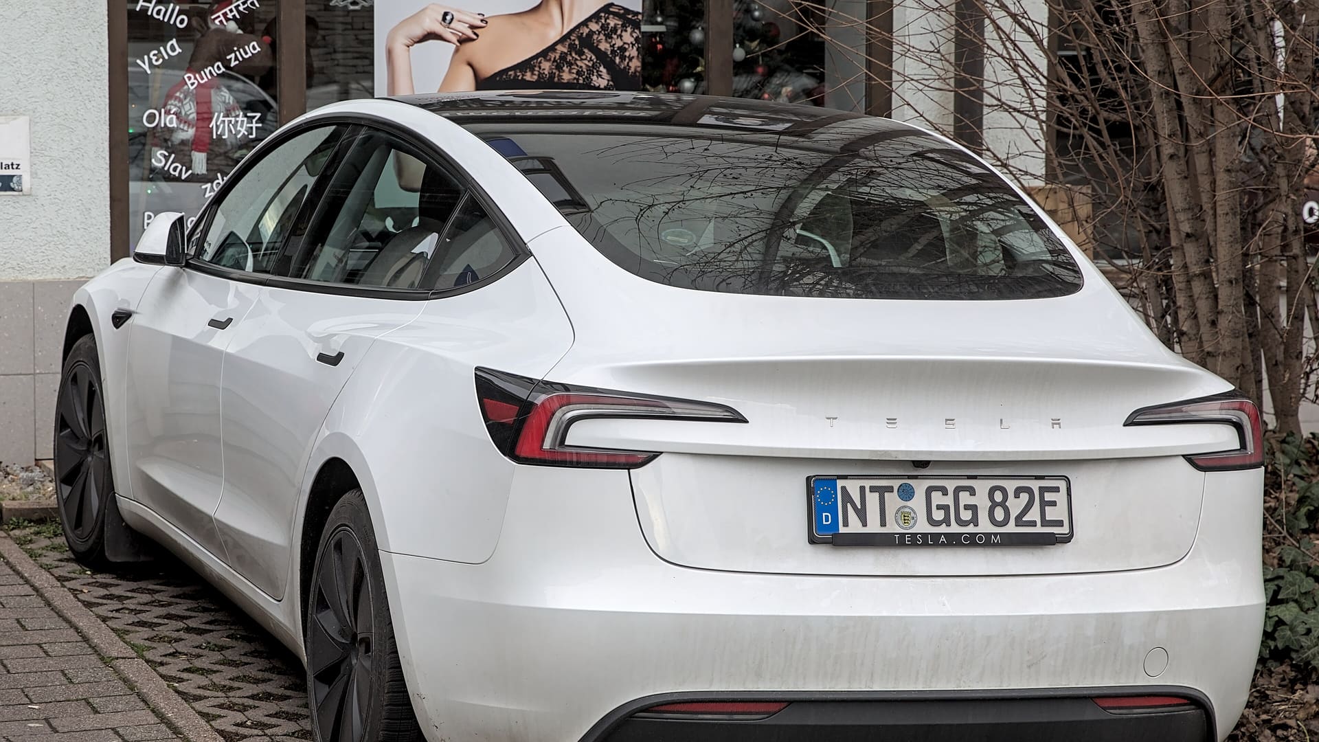 A 2023 Tesla Model 3 sedan parked outdoors in Filderstadt, Germany