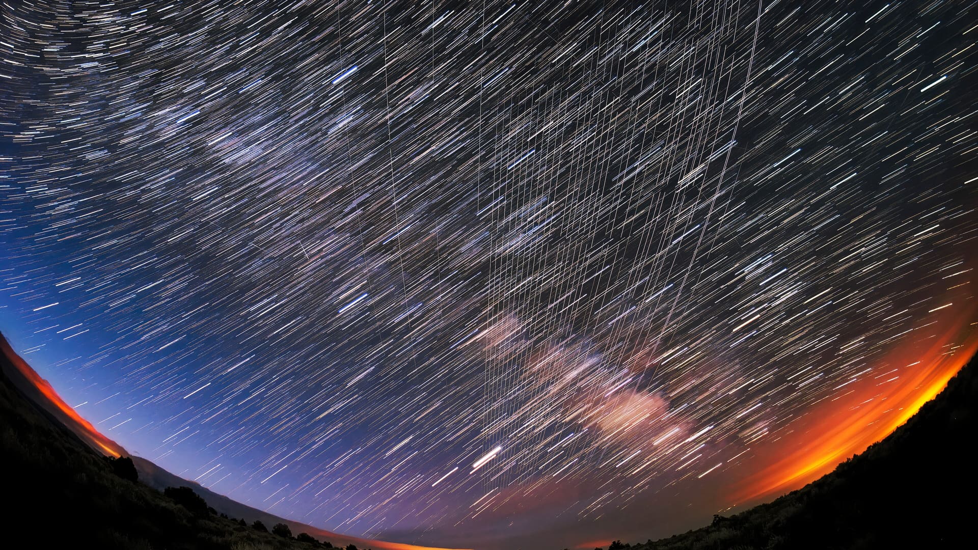 Starlink satellites passing overhead near Carson National Forest, New Mexico