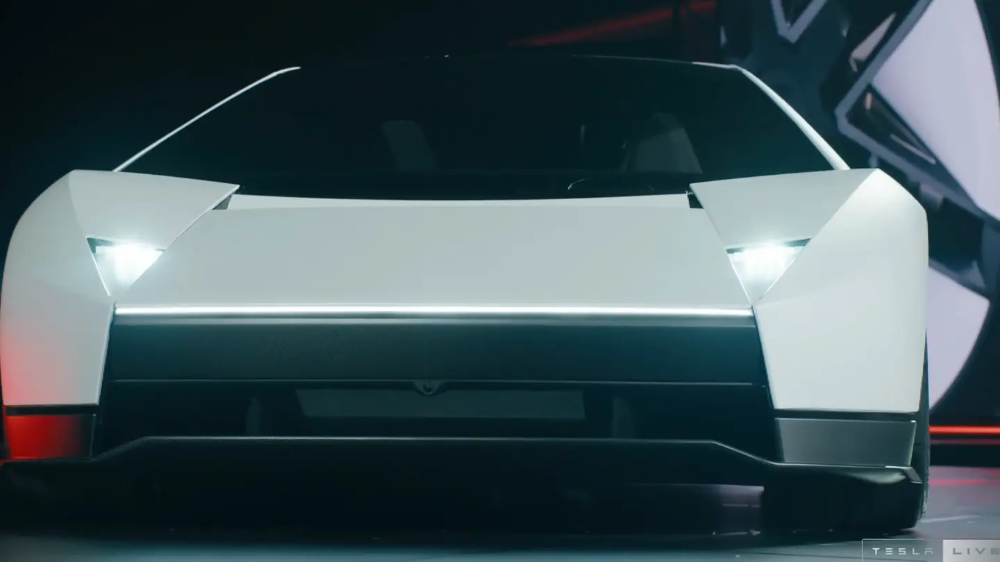 The new Roadster head on, with a flat creased nose and small triangular headlights
